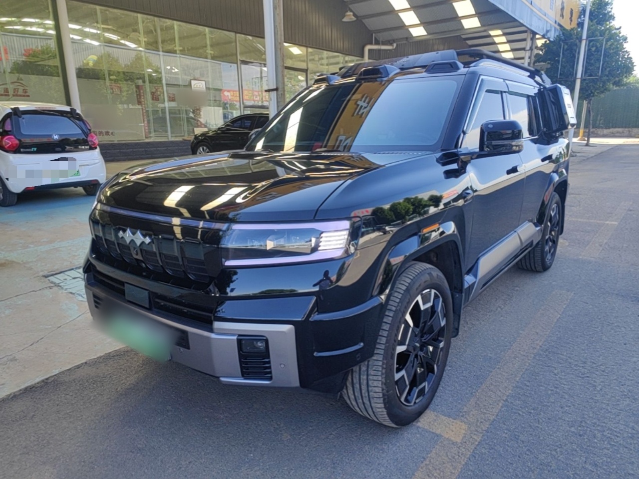 Под передней частью автомобиля