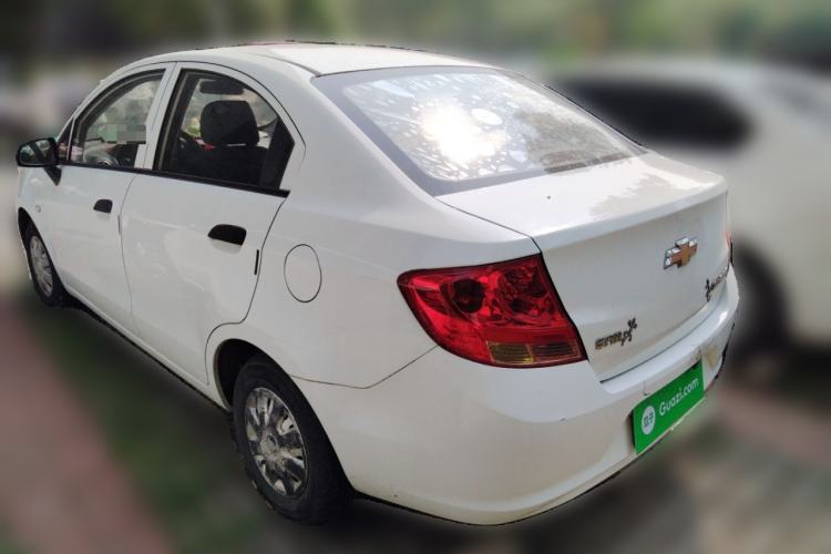 Used Chevrolet Sail 2013 Sedan 1.2L Manual Fashionable Happiness Edition Rear Left 45 Deg