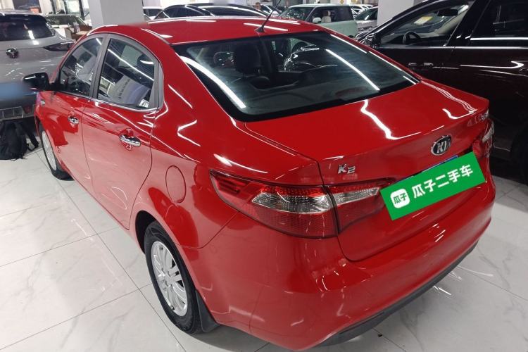 Used Kia K2 2012 Sedan 1.4L Automatic GLS Commemorative Edition Rear Left 45 Deg