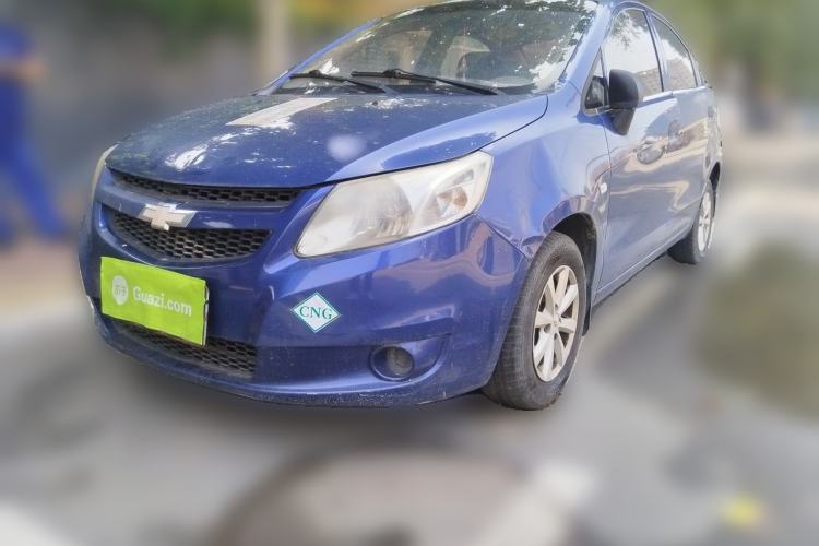 Used Chevrolet Sail 2013 Sedan 1.2L Manual Fashionable Happiness Edition Front Left 45 Deg