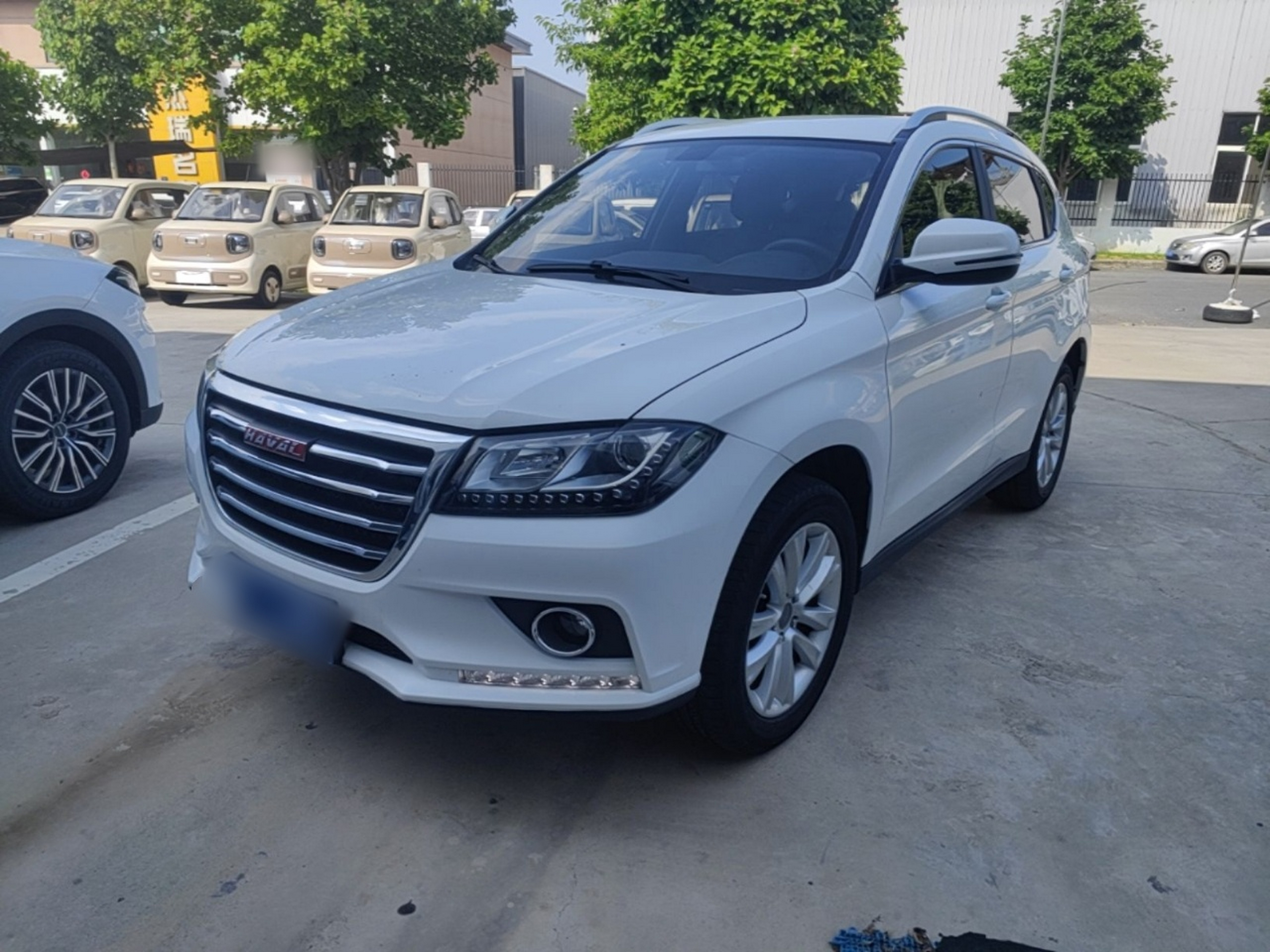 Под передней частью автомобиля