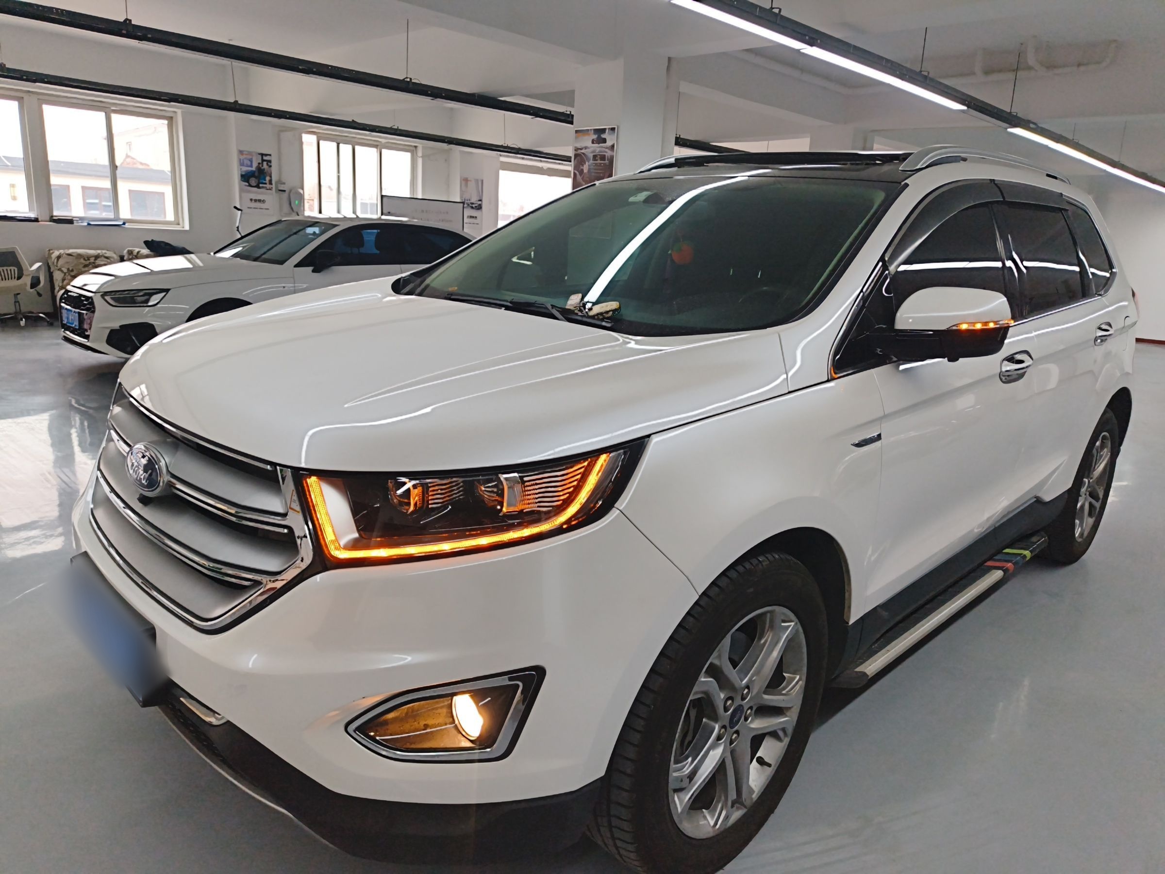 Под передней частью автомобиля