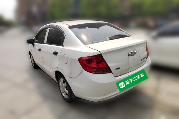 Used Chevrolet Sail 2013 Sedan 1.4L Manual Ideal Happiness Edition Rear Left 45 Deg