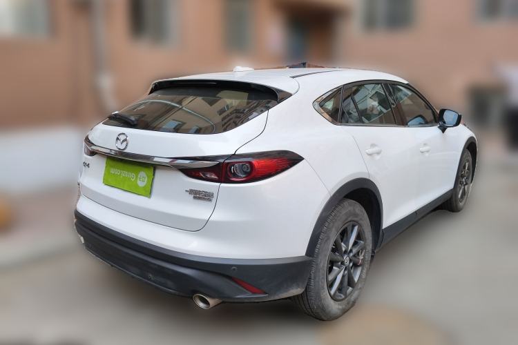 Used Mazda CX-4 2021 2.0L Automatic Two-Wheel Drive Blue Sky Dynamic Edition Rear Right 45 Deg