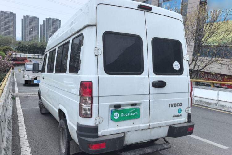 Used Iveco Daily 2022 2.5T A37 M1 Passenger Van 5-9 Seats Long Wheelbase Mid-Roof Design Dual Tires Manual Doors Rear Left 45 Deg