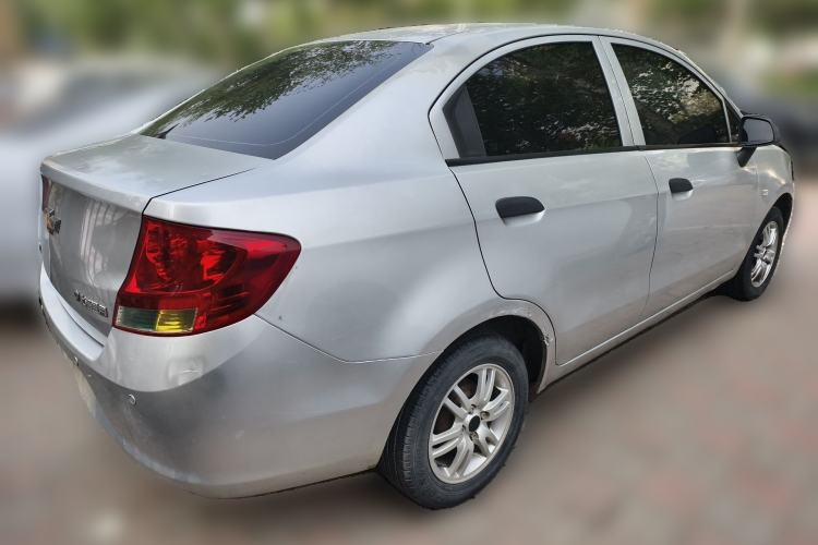 Used Chevrolet Sail 2013 Sedan 1.4L Manual Ideal Happiness Edition Rear Right 45 Deg