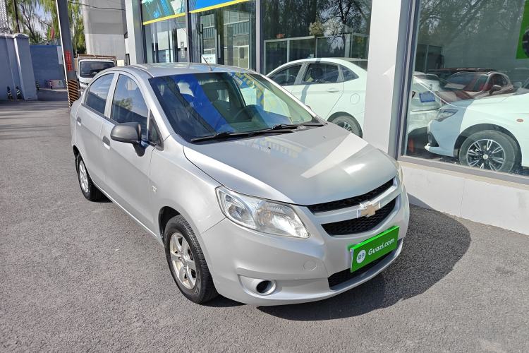 Used Chevrolet Sail 2013 Sedan 1.2L Manual Fashionable Happiness Edition Front Right 45 Deg