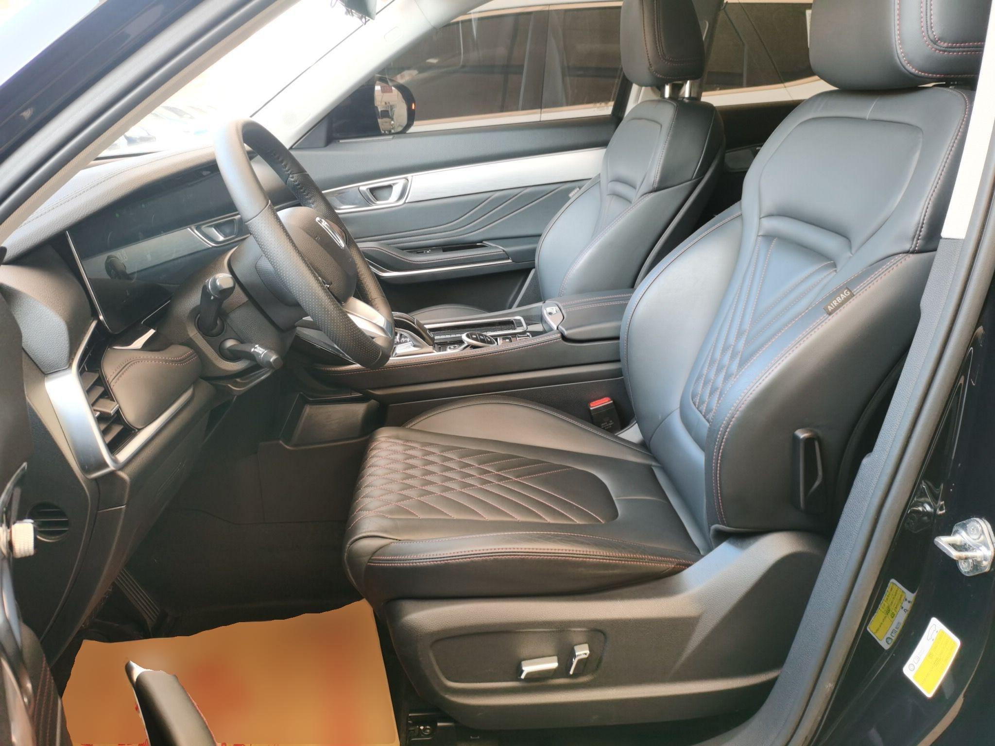 Переднее сиденье в автомобиле