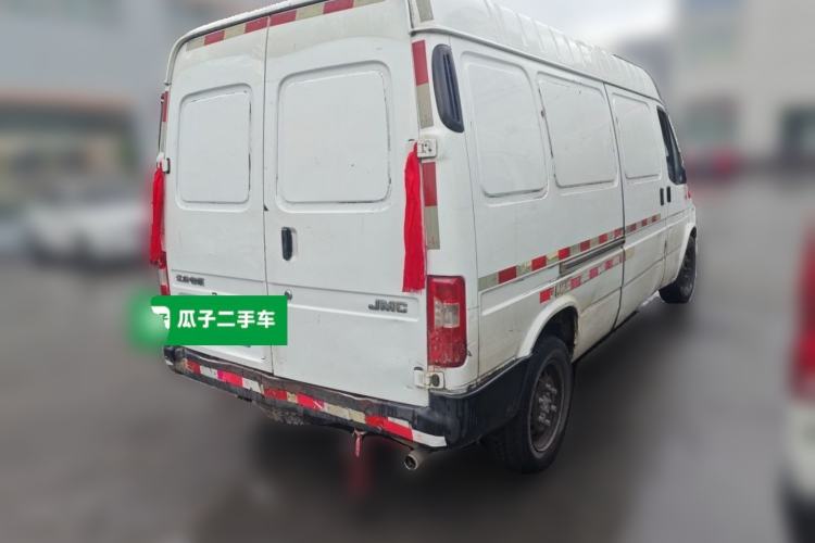 Used JMC Transit 2019 2.8T Commercial Version Long Wheelbase Mid-Roof 3-Seater Rear Single Tire China VI Emission Standard – JX493 Rear Right 45 Deg