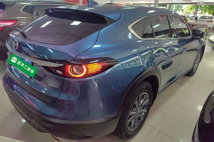 Used Mazda CX-4 2021 2.0L Automatic Two-Wheel Drive Blue Sky Exploration Edition Rear Right 45 Deg