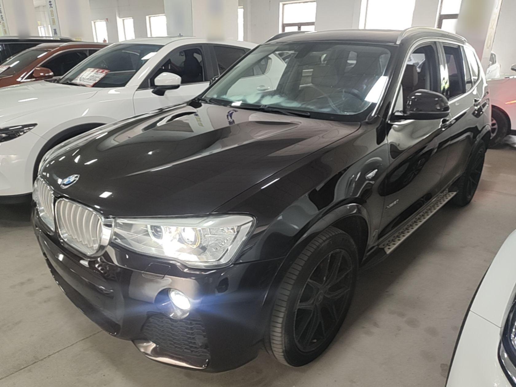 Под передней частью автомобиля