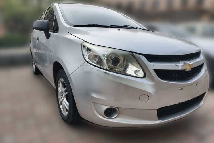 Used Chevrolet Sail 2013 Sedan 1.4L Manual Ideal Happiness Edition Front Right 45 Deg