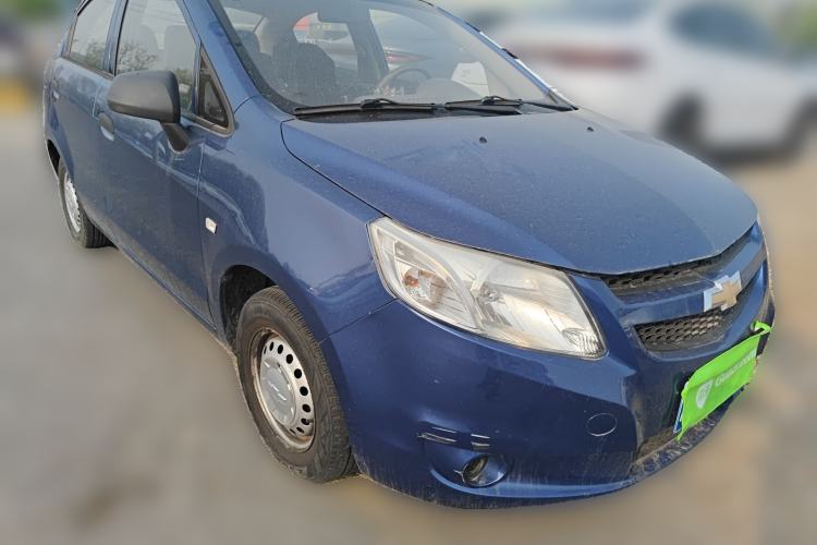 Used Chevrolet Sail 2013 Sedan 1.2L Manual Fashionable Happiness Edition Front Right 45 Deg