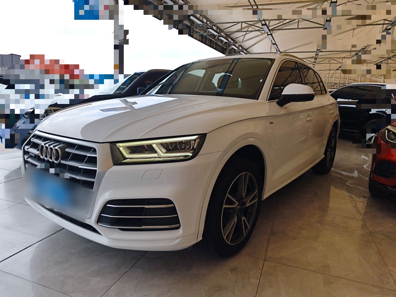 Под передней частью автомобиля