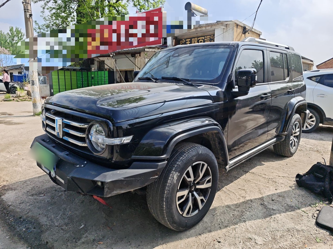 Под передней частью автомобиля