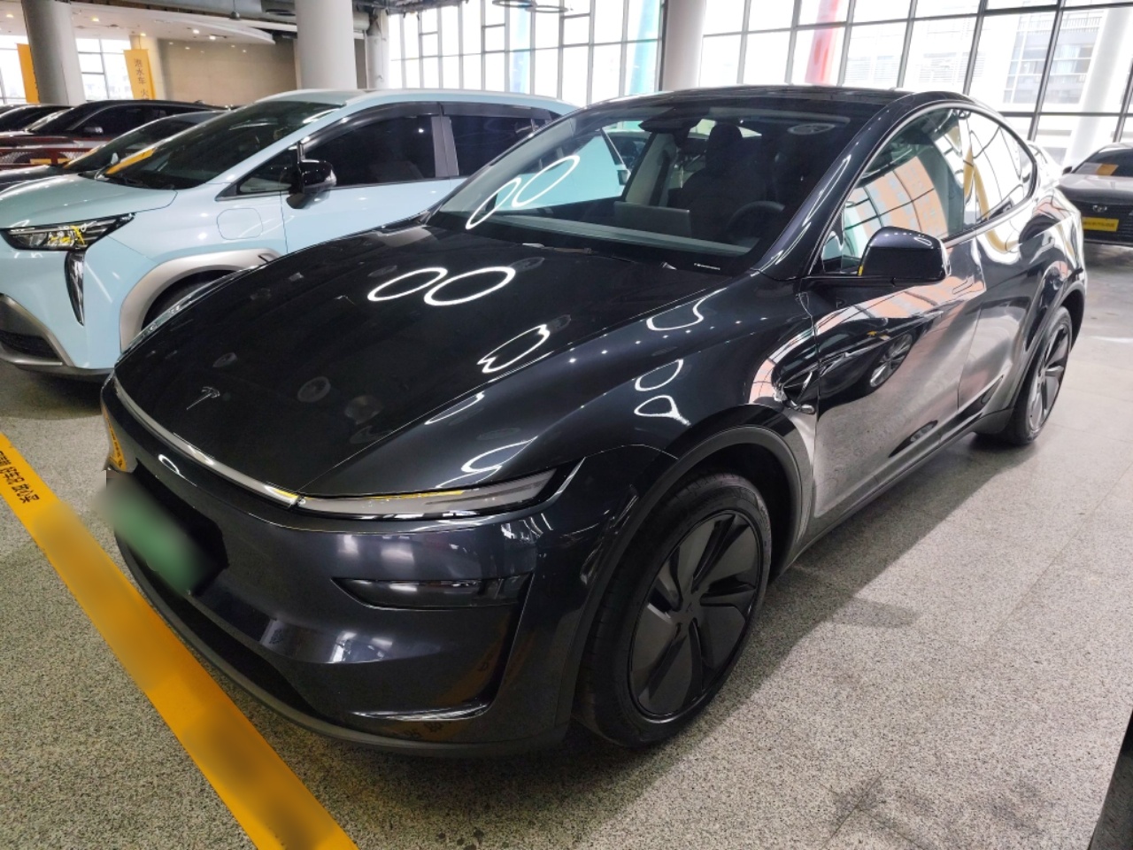 Под передней частью автомобиля