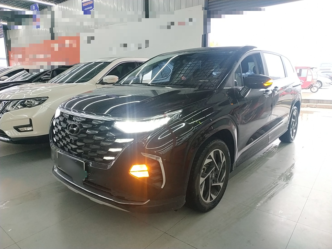 Под передней частью автомобиля