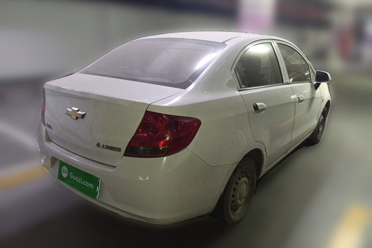 Used Chevrolet Sail 2013 Sedan 1.2L Manual Fashionable Happiness Edition Rear Right 45 Deg