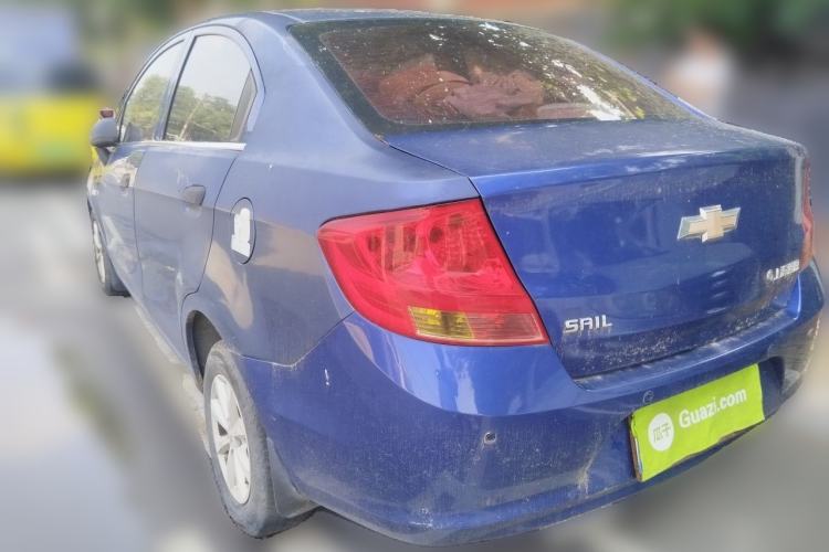 Used Chevrolet Sail 2013 Sedan 1.2L Manual Fashionable Happiness Edition Rear Left 45 Deg