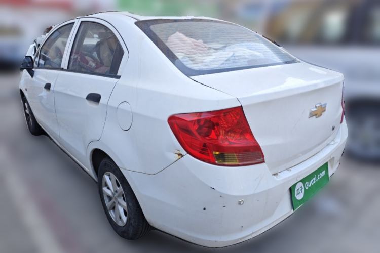 Used Chevrolet Sail 2013 Sedan 1.2L Manual Warm Edition Rear Left 45 Deg