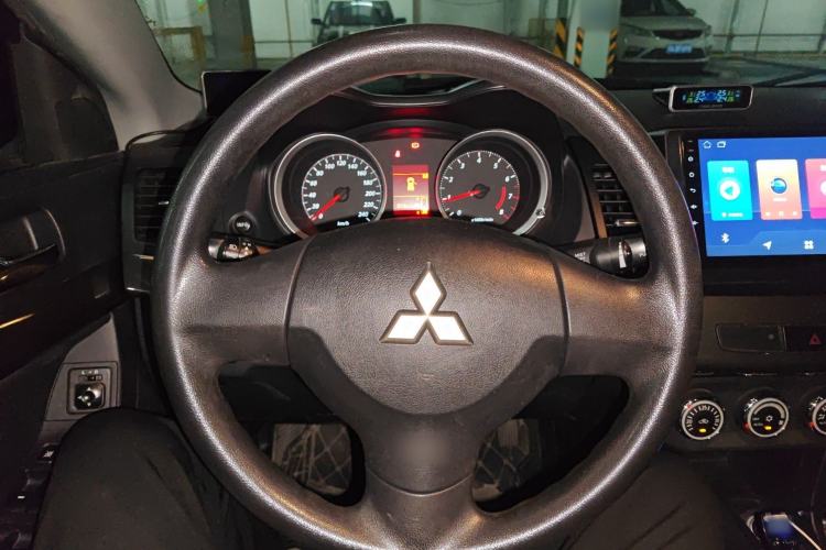 Used Mitsubishi Lancer EX 2012 Xinyuan Edition 2.0L Manual Comfort Model Steering Wheel