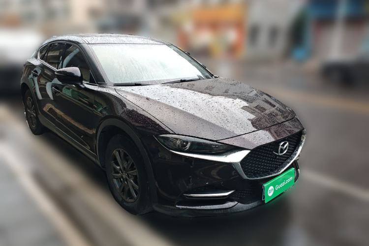 Used Mazda CX-4 2021 2.0L Automatic Two-Wheel Drive Blue Sky Exploration Edition Front Right 45 Deg