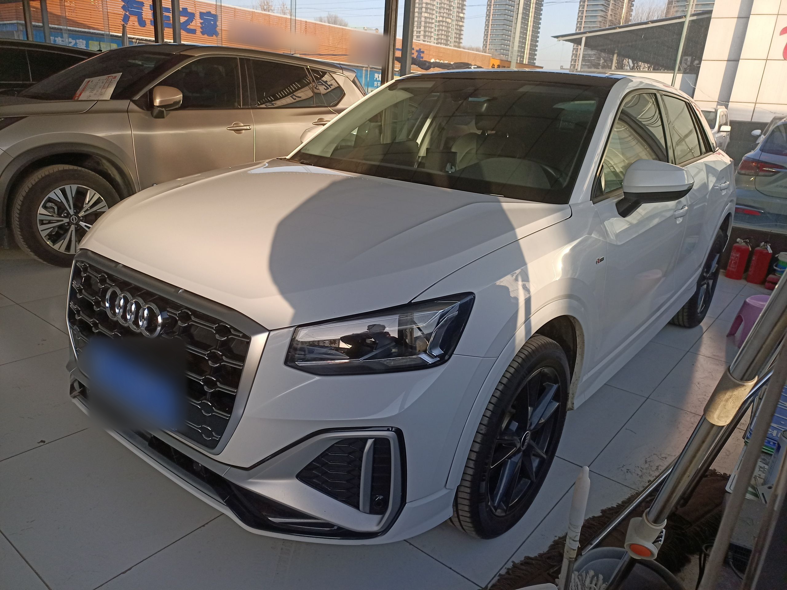 Под передней частью автомобиля