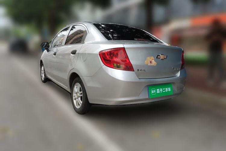 Used Chevrolet Sail 2013 Sedan 1.4L Manual Ideal Happiness Edition Rear Left 45 Deg