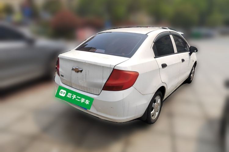 Used Chevrolet Sail 2013 Sedan 1.4L Manual Ideal Happiness Edition Rear Right 45 Deg