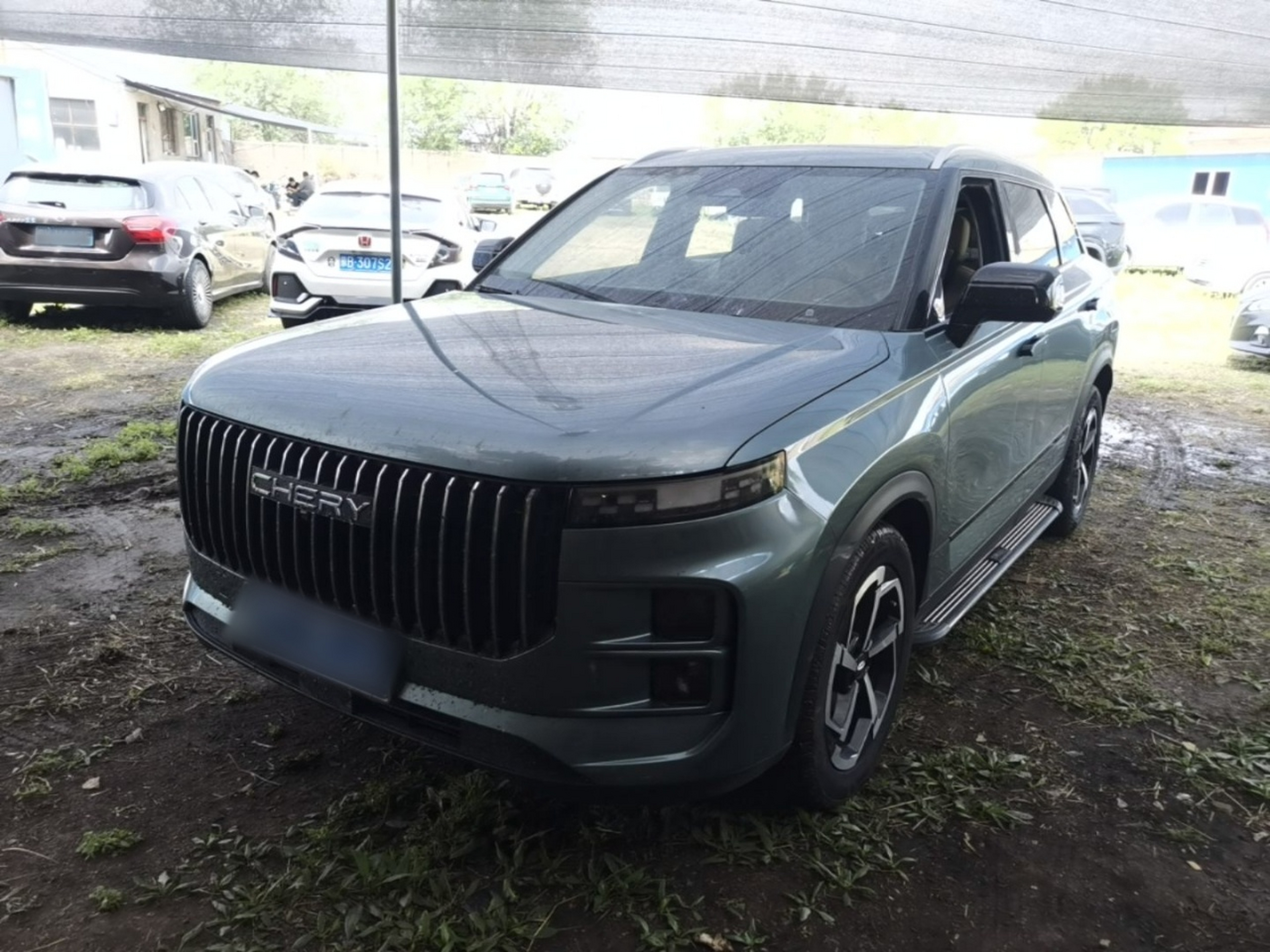 Под передней частью автомобиля