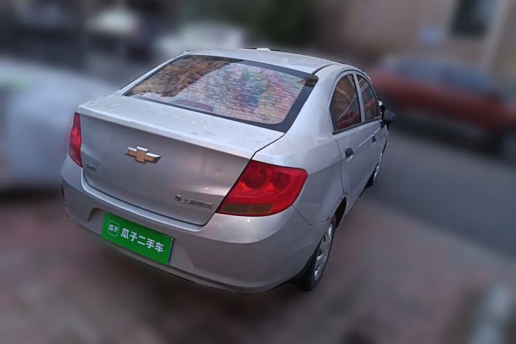 Used Chevrolet Sail 2013 Sedan 1.2L AMT Ideal Edition Rear Right 45 Deg