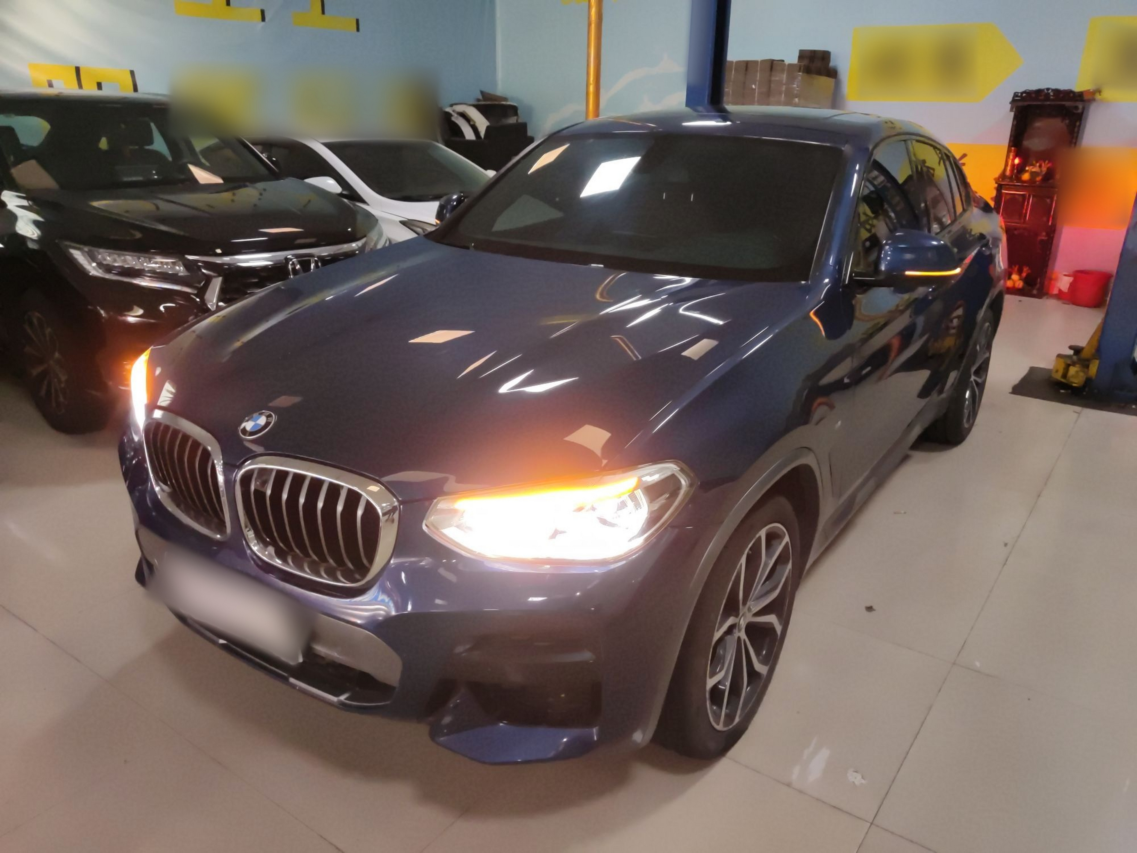 Под передней частью автомобиля