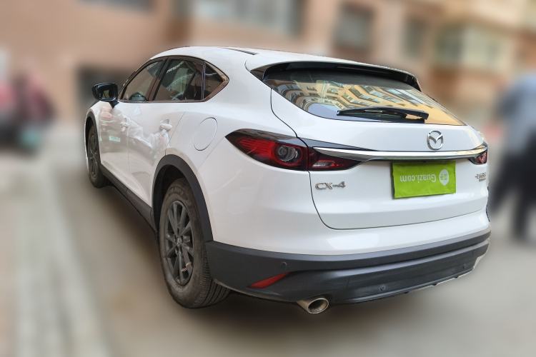 Used Mazda CX-4 2021 2.0L Automatic Two-Wheel Drive Blue Sky Dynamic Edition Rear Left 45 Deg