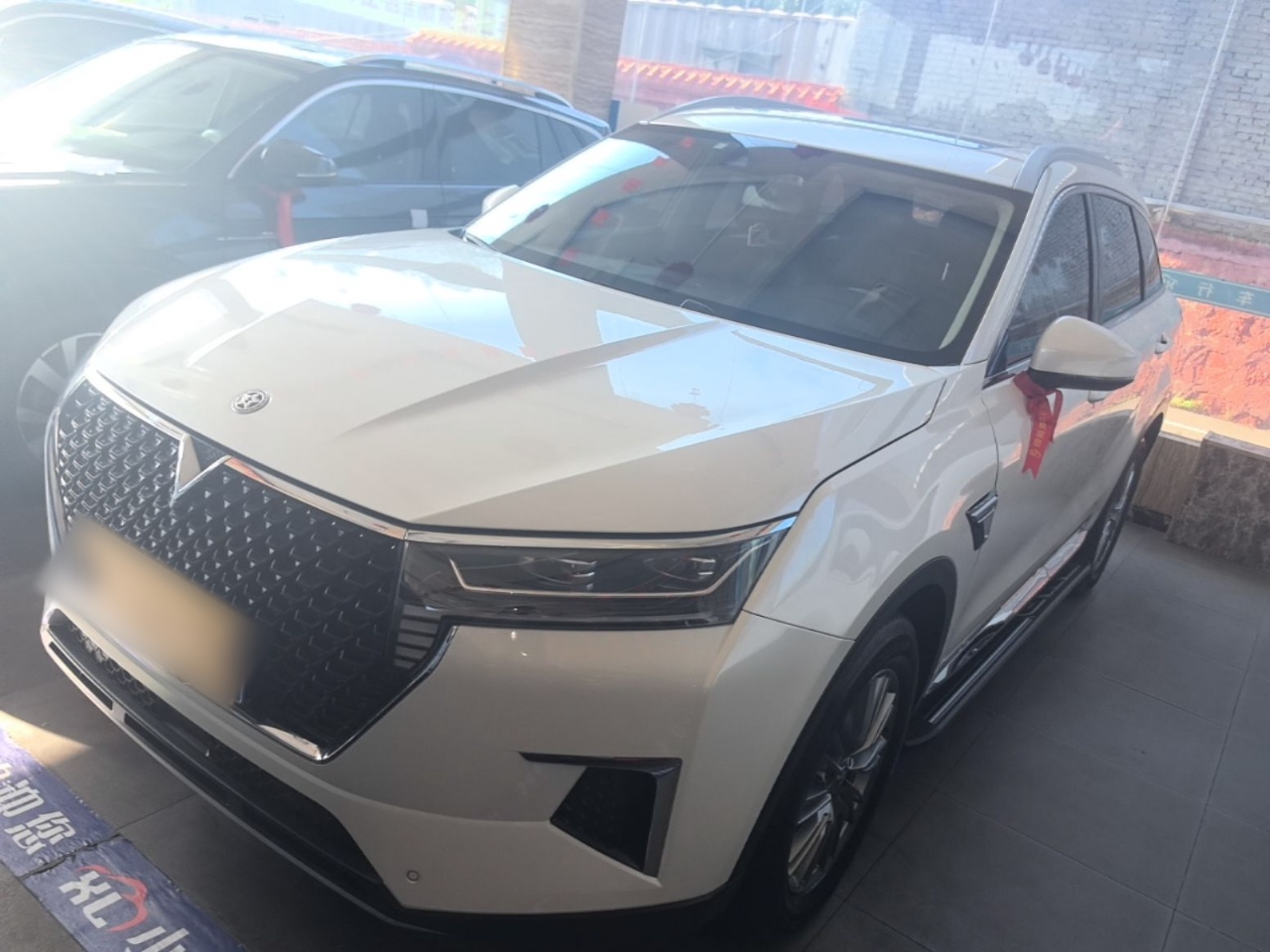 Под передней частью автомобиля
