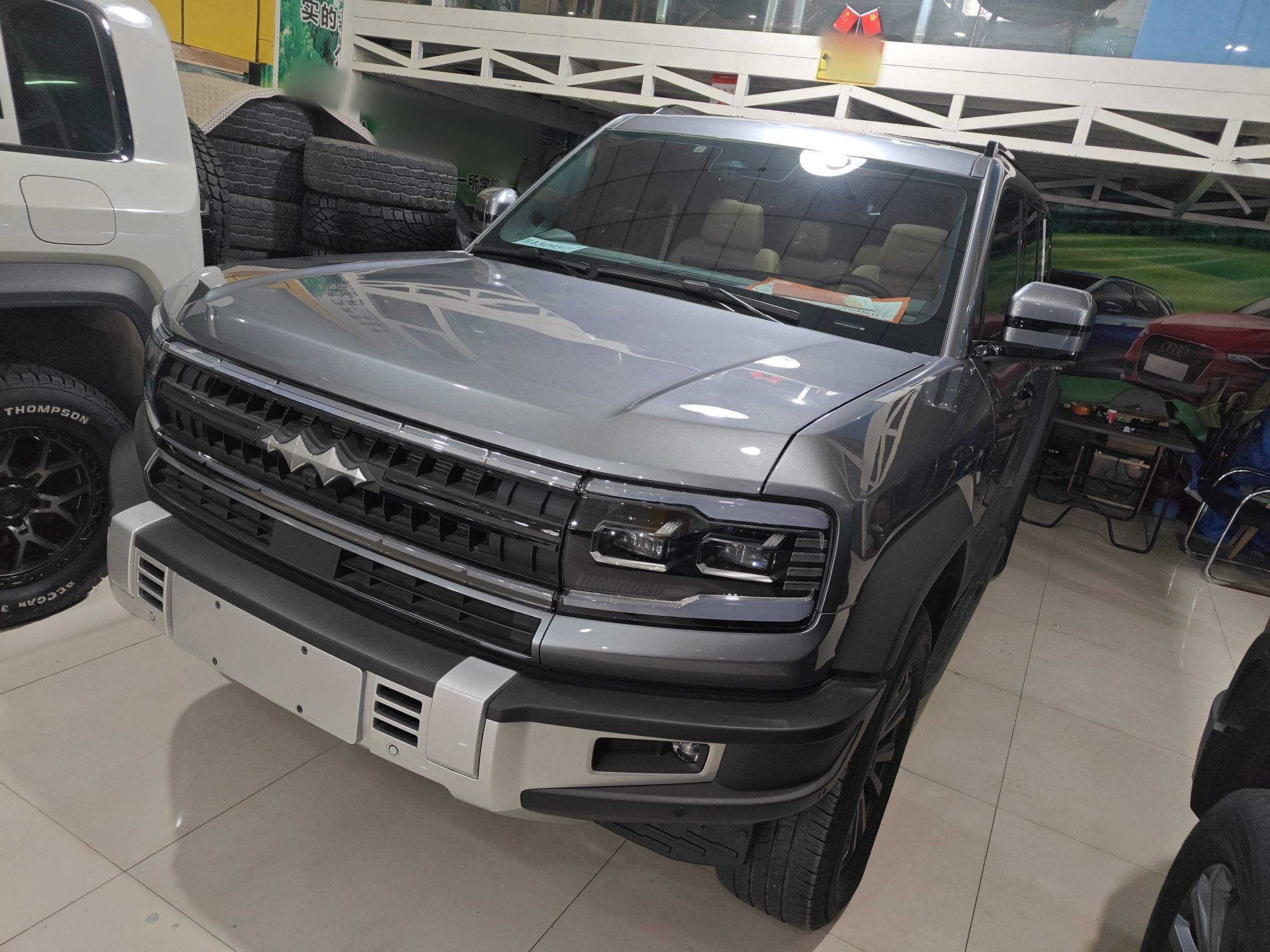 Под передней частью автомобиля