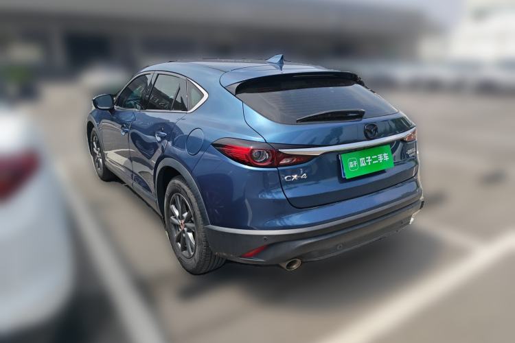 Used Mazda CX-4 2020 2.0L Automatic Two-Wheel Drive Blue Sky Dynamic Edition Rear Left 45 Deg