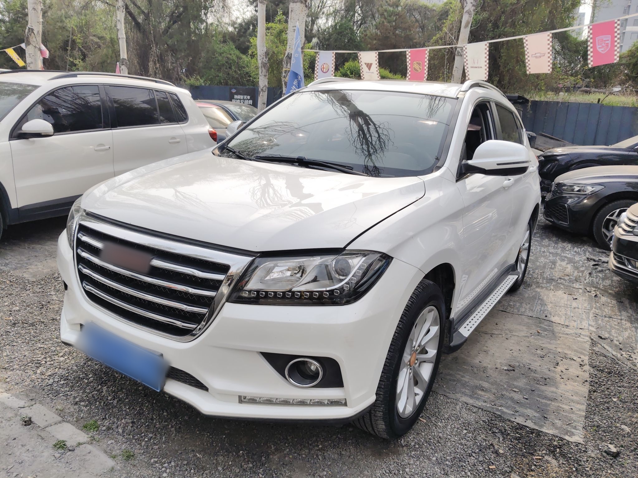 Под передней частью автомобиля