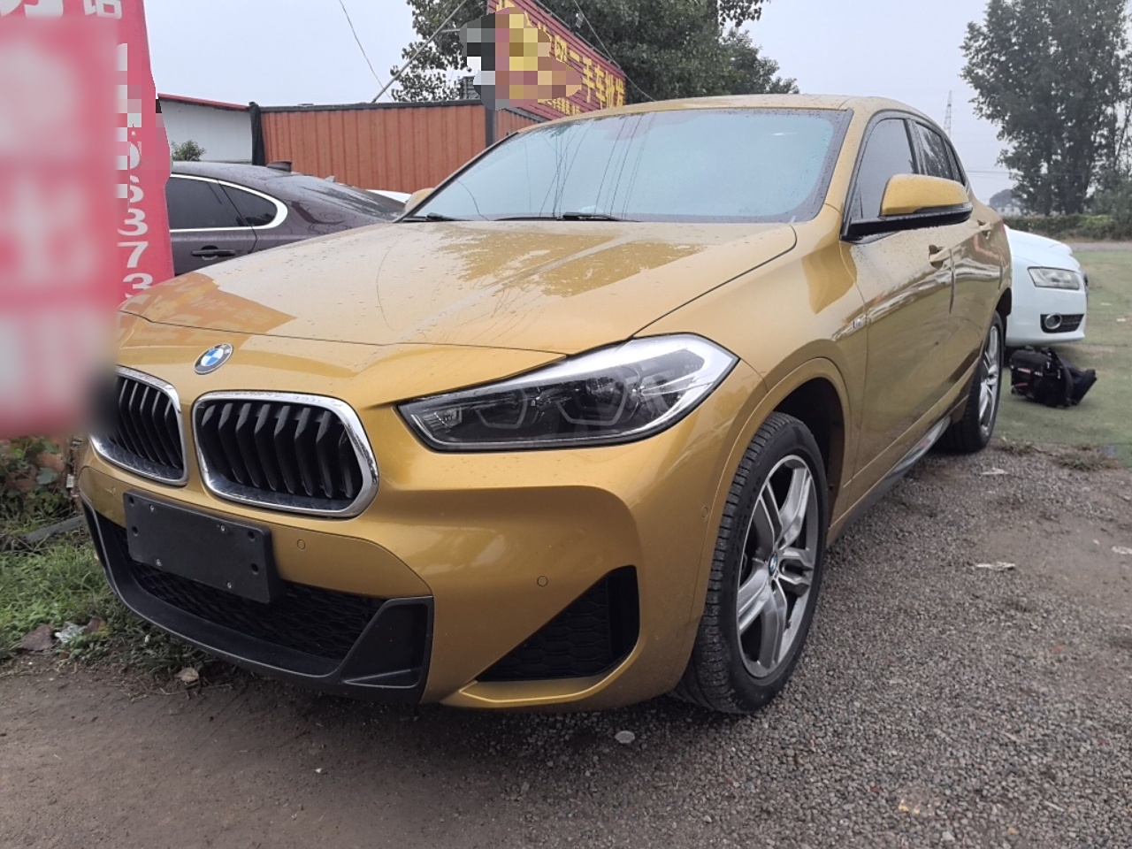 Под передней частью автомобиля