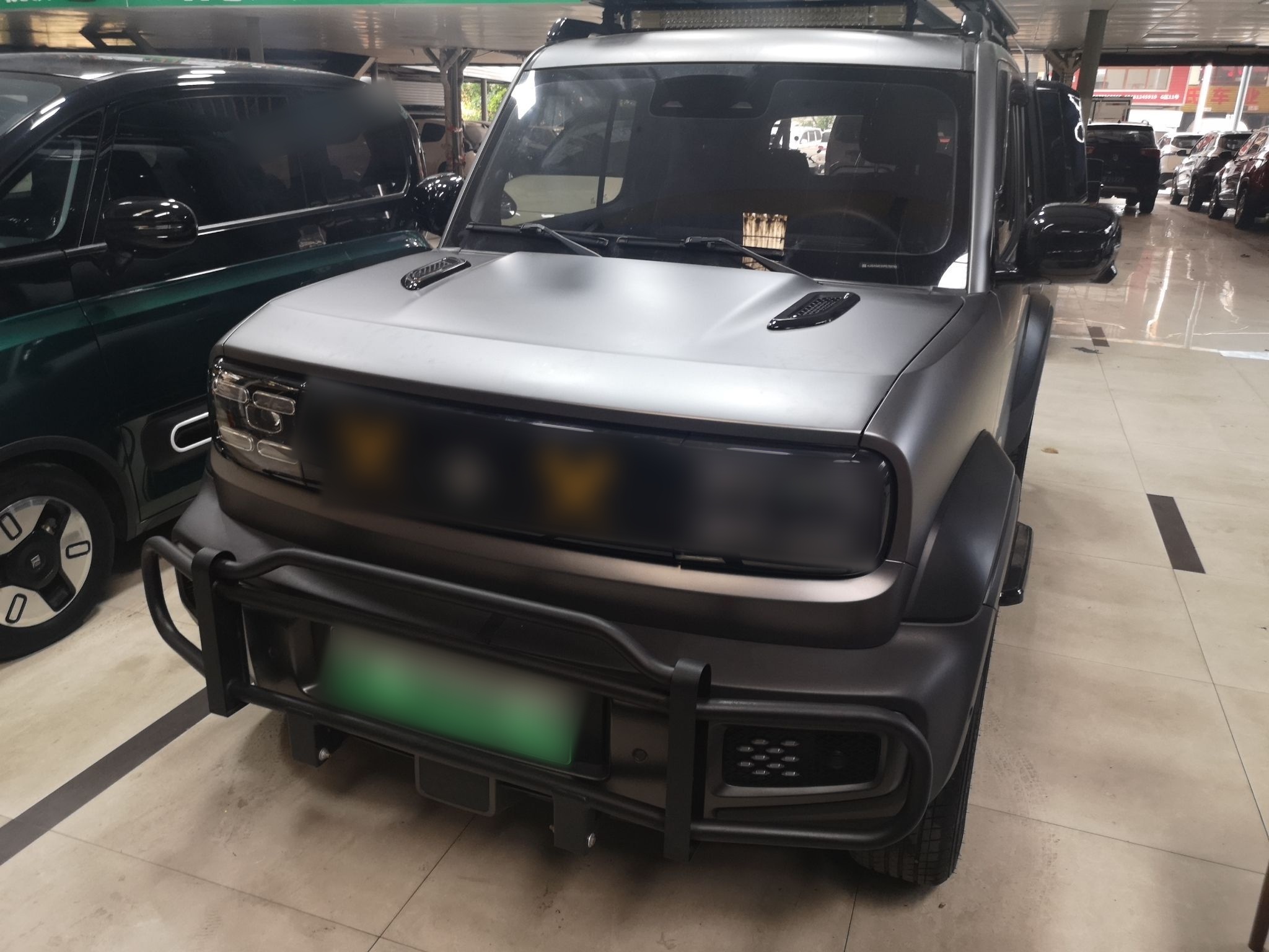 Под передней частью автомобиля