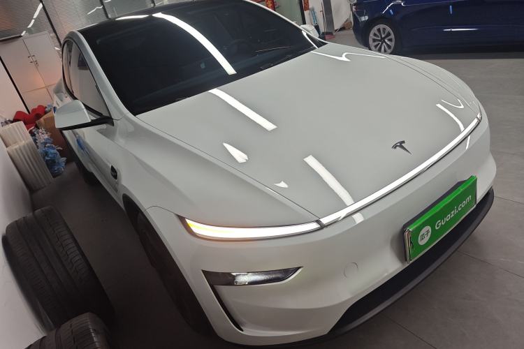 Used Tesla Model Y 2025 Long-Range All-Wheel Drive First Edition Front Right 45 Deg