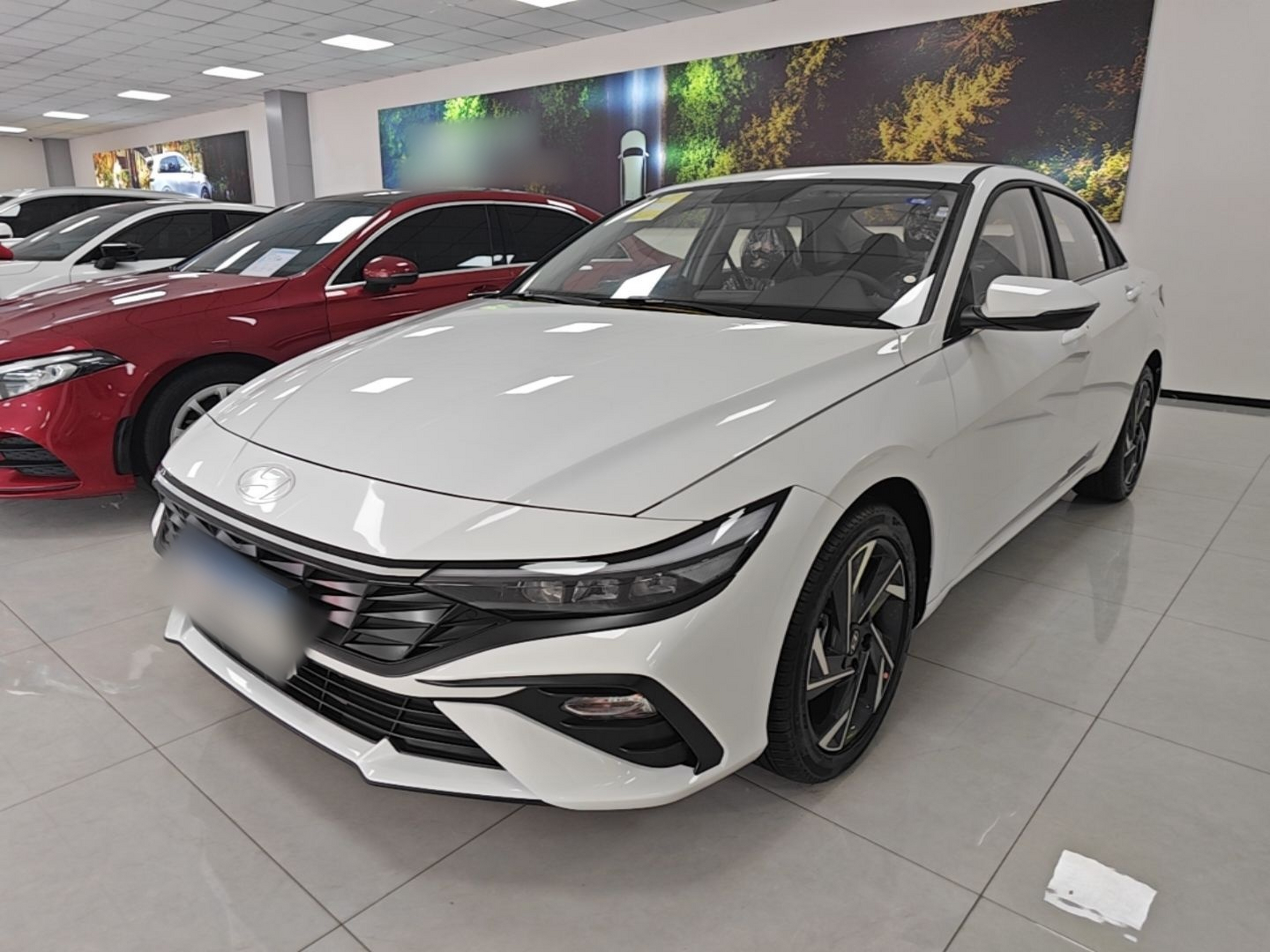 Под передней частью автомобиля