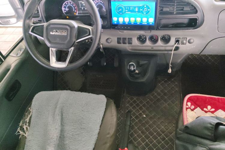 Used JMC Transit 2019 2.8T Commercial Version Long Wheelbase Mid-Roof 6-Seater Rear Single Tire China VI Emission Standard – JX493 Steering Wheel