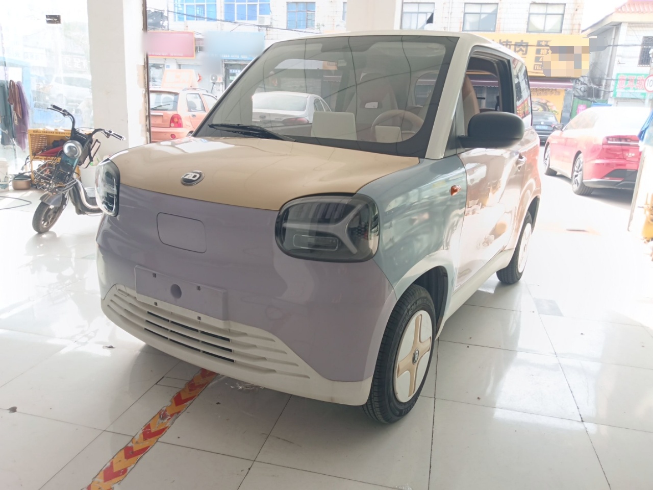 Под передней частью автомобиля