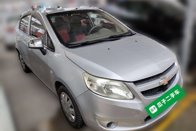 Used Chevrolet Sail 2013 Sedan 1.2L Manual Ideal Edition Front Right 45 Deg