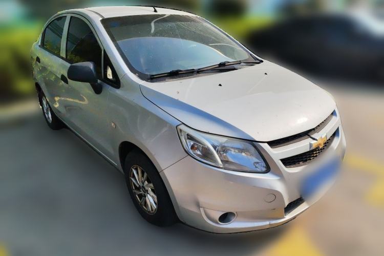 Used Chevrolet Sail 2013 Sedan 1.2L Manual Fashionable Happiness Edition Front Right 45 Deg