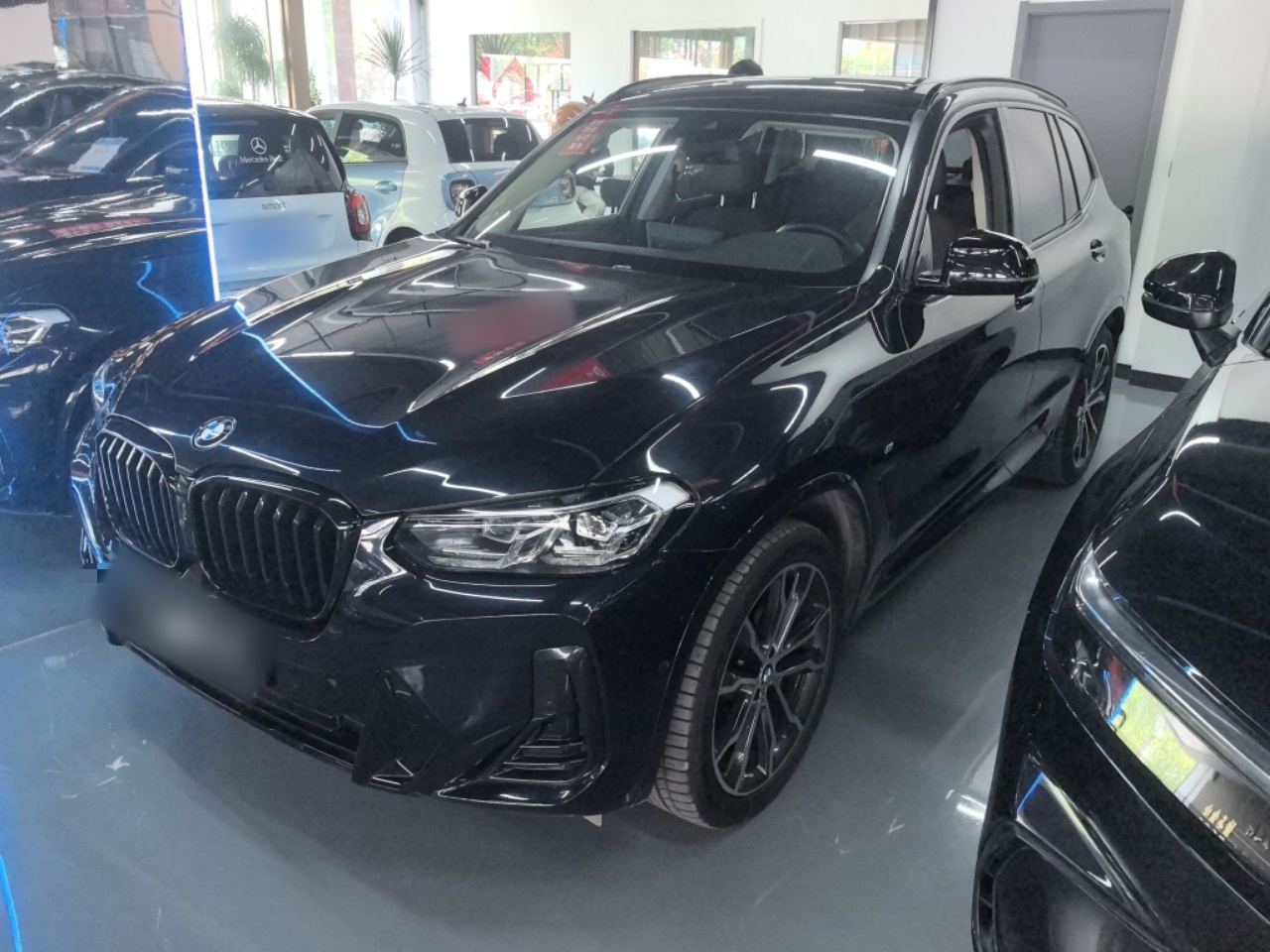 Под передней частью автомобиля