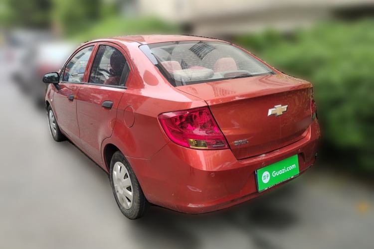 Used Chevrolet Sail 2013 Sedan 1.2L AMT Ideal Edition Rear Left 45 Deg