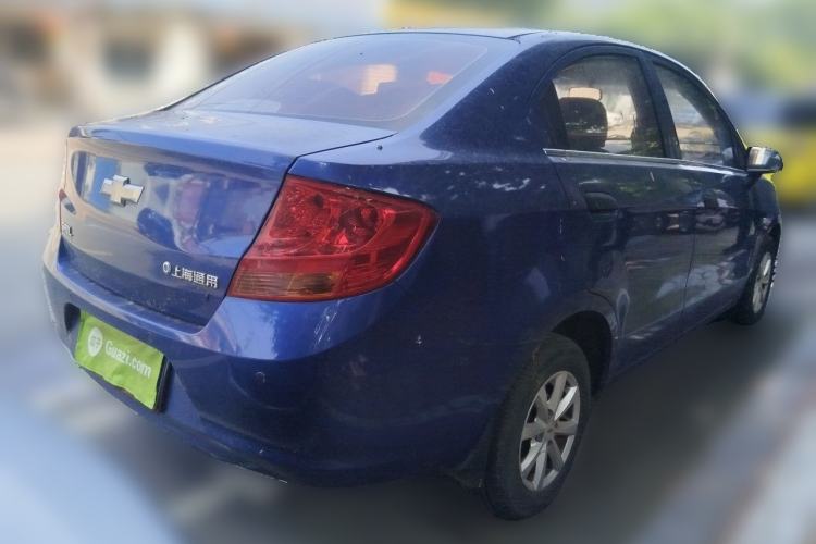 Used Chevrolet Sail 2013 Sedan 1.2L Manual Fashionable Happiness Edition Rear Right 45 Deg