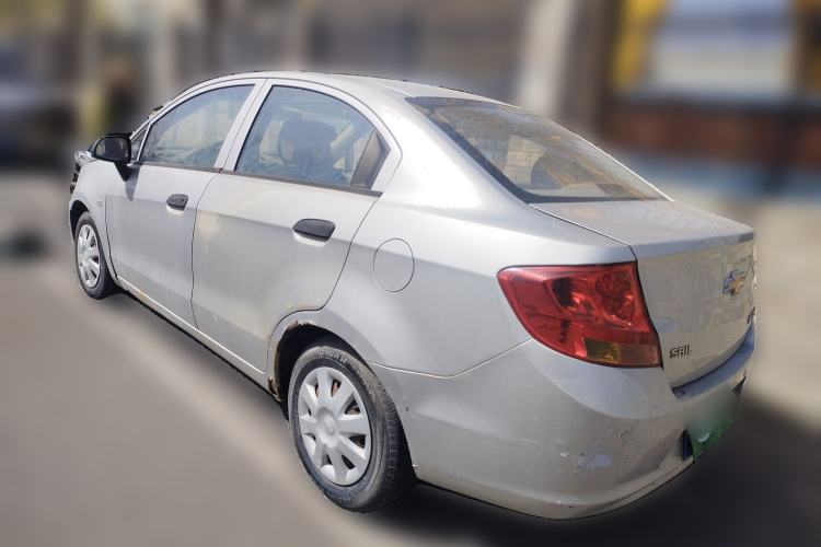 Used Chevrolet Sail 2013 Sedan 1.2L AMT Ideal Edition Rear Left 45 Deg