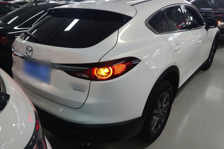 Used Mazda CX-4 2020 2.0L Automatic Two-Wheel Drive Blue Sky Dynamic Edition Rear Right 45 Deg